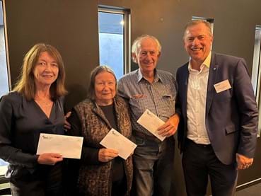 Steve Helmich, Board Chair, with winners at local Lismore member event